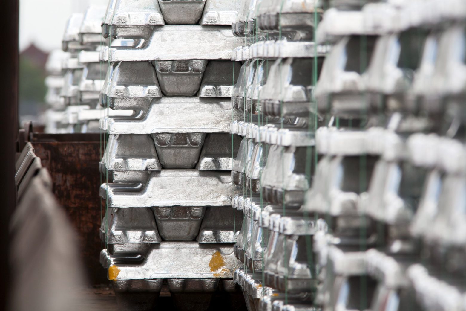 Stacked aluminium ingots in a smelting facility